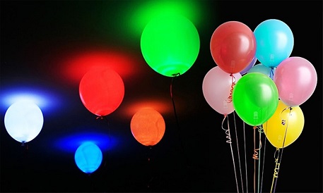 glow in the dark balloons on the floor